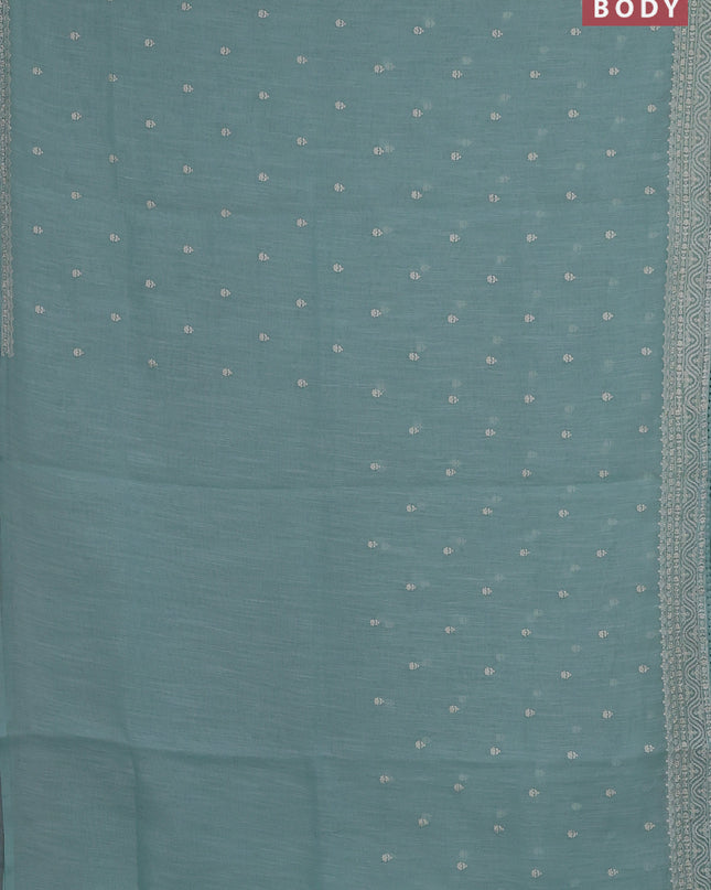 Linen cotton saree teal shade with embroidery buttas and embroidered border