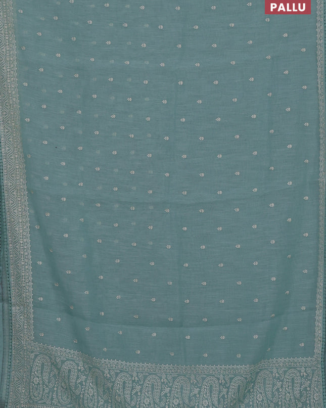 Linen cotton saree teal shade with embroidery buttas and embroidered border