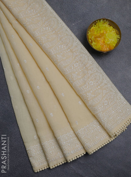 Linen cotton saree pale yellow with embroidery buttas and embroidered border