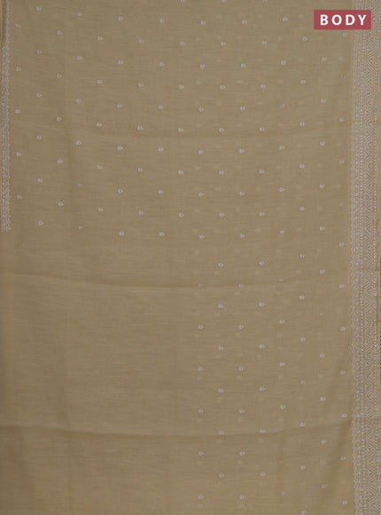 Linen cotton saree pale yellow with embroidery buttas and embroidered border
