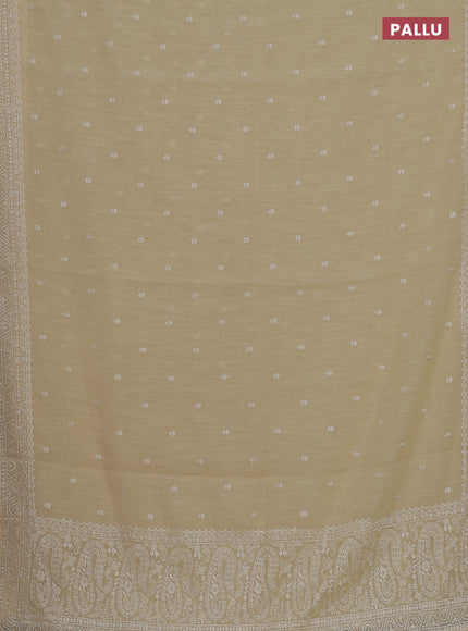 Linen cotton saree pale yellow with embroidery buttas and embroidered border