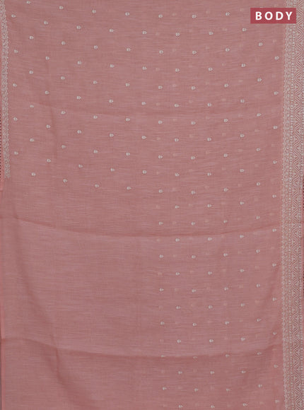 Linen cotton saree peach shade with embroidery buttas and embroidered border