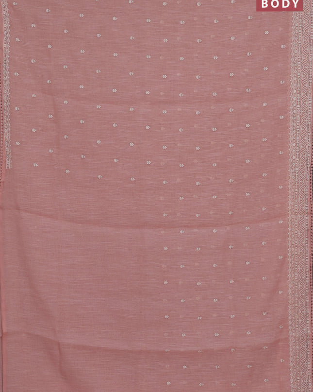 Linen cotton saree peach shade with embroidery buttas and embroidered border