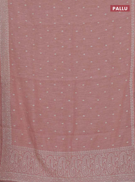Linen cotton saree peach shade with embroidery buttas and embroidered border