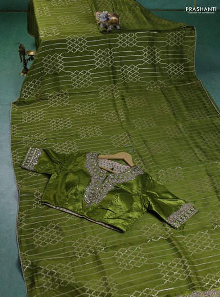 Munga tussar silk saree mehendi green with allover zari woven brocade weaves and gottapatti work readymade blouse