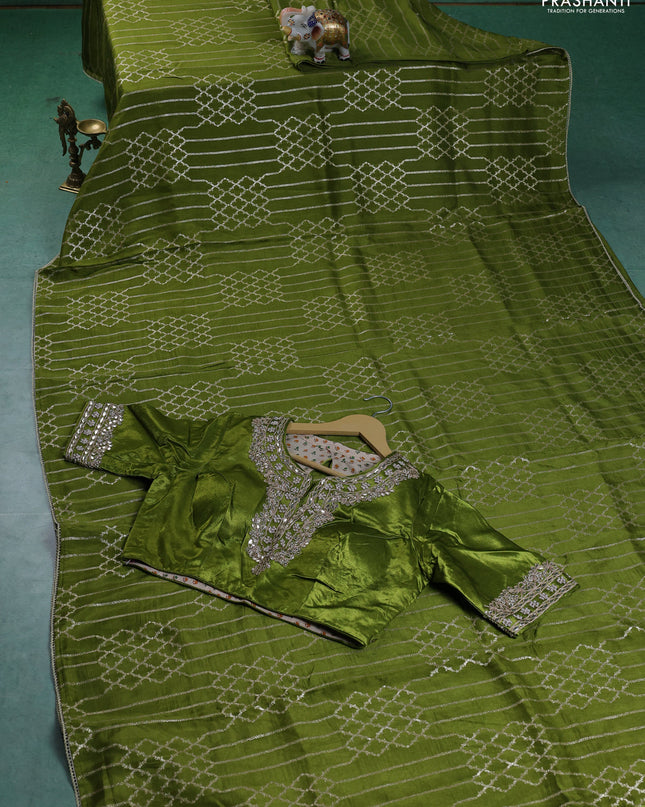 Munga tussar silk saree mehendi green with allover zari woven brocade weaves and gottapatti work readymade blouse