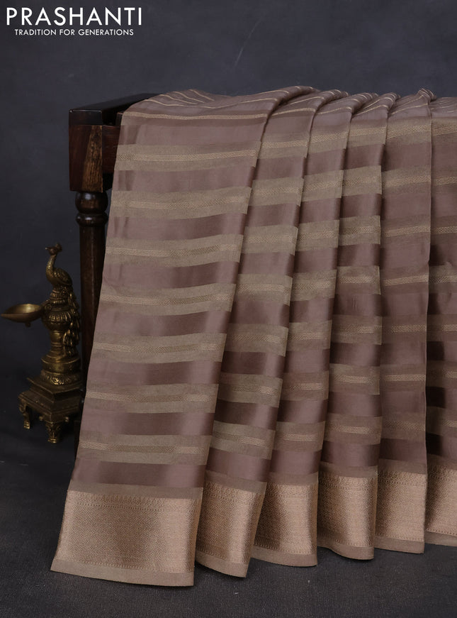 Organza saree grey with zari stripes pattern and gottapatti work readymade blouse