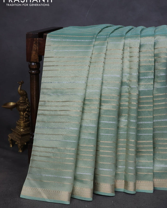 Tissue saree teal shade with silver & gold zari weaves and gottapatti work readymade blouse