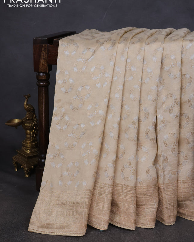 Munga silk saree beige with allover zari woven brocade pattern & gottapatti work and readymade blouse