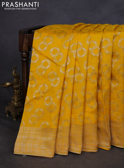 Munga silk saree yellow with allover zari woven brocade pattern & gottapatti work and readymade blouse