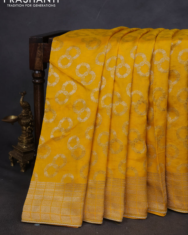 Munga silk saree yellow with allover zari woven brocade pattern & gottapatti work and readymade blouse