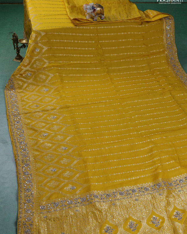 Banarasi silk saree yellow with zari woven brocade weaves & gottapatti work