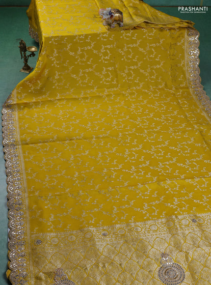 Banarasi silk saree yellow with allover zari woven brocade pattern and gottapatti work border