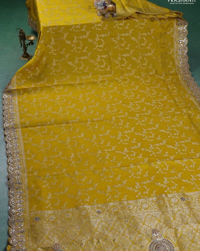 Banarasi silk saree yellow with allover zari woven brocade pattern and gottapatti work border