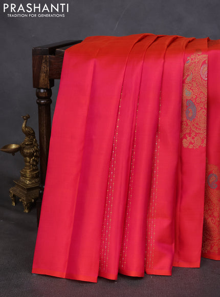 Pure kanchipuram silk saree dual shade of pinkish orange and teal green with zari weaves & buttas in borderless style