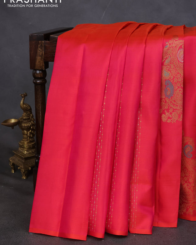 Pure kanchipuram silk saree dual shade of pinkish orange and teal green with zari weaves & buttas in borderless style