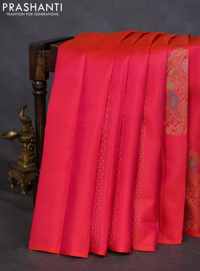 Pure kanchipuram silk saree dual shade of pinkish orange and teal green with zari weaves & buttas in borderless style