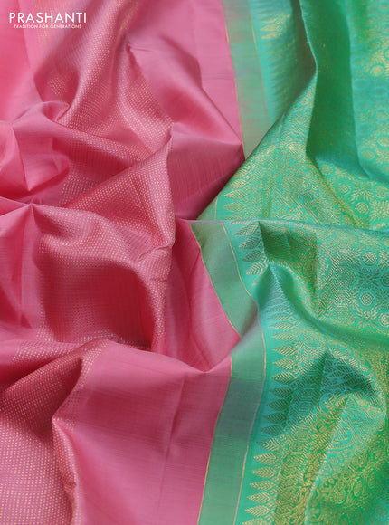Pure kanchipuram silk saree peach pink and teal green with allover zari weaves in borderless style