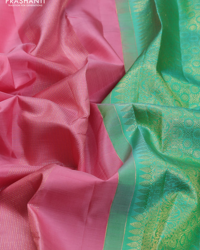Pure kanchipuram silk saree peach pink and teal green with allover zari weaves in borderless style
