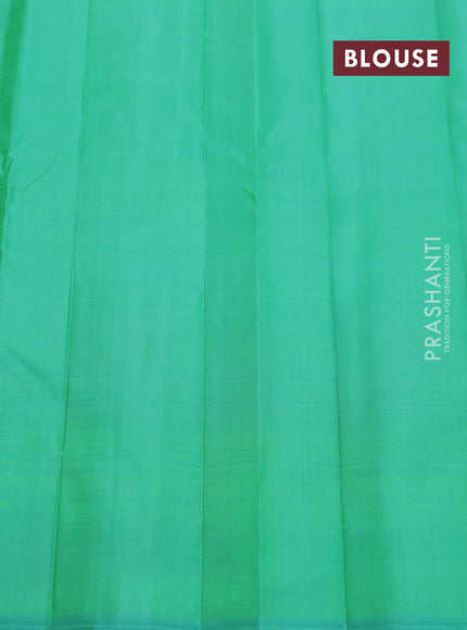 Pure kanchipuram silk saree peach pink and teal green with allover zari weaves in borderless style