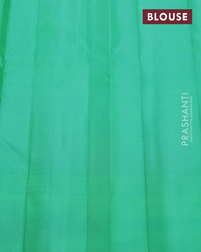 Pure kanchipuram silk saree peach pink and teal green with allover zari weaves in borderless style