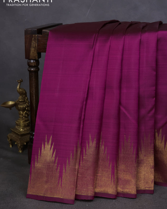 Pure kanchipuram silk saree purple with plain body and temple design zari woven border