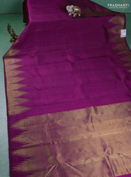 Pure kanchipuram silk saree purple with plain body and temple design zari woven border