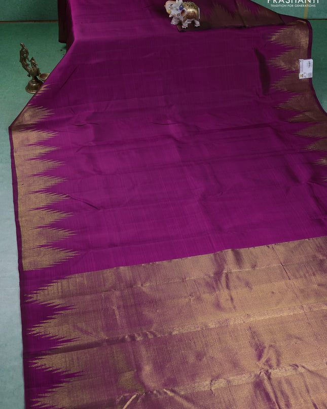 Pure kanchipuram silk saree purple with plain body and temple design zari woven border