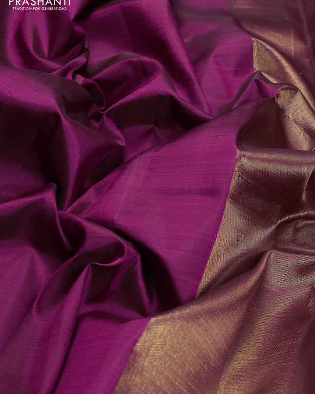 Pure kanchipuram silk saree purple with plain body and temple design zari woven border