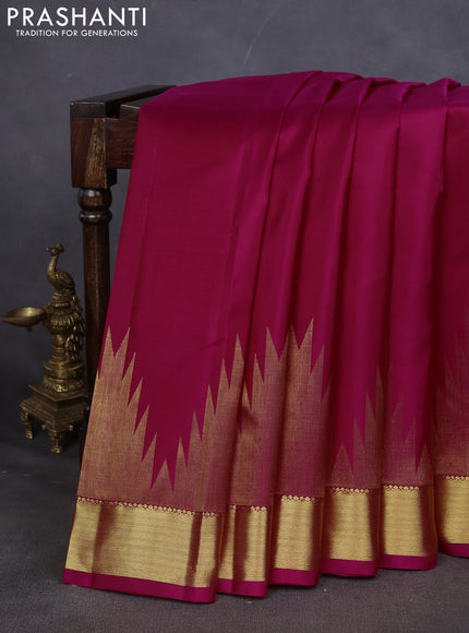 Pure kanchipuram silk saree pink with plain body and temple design zari woven border