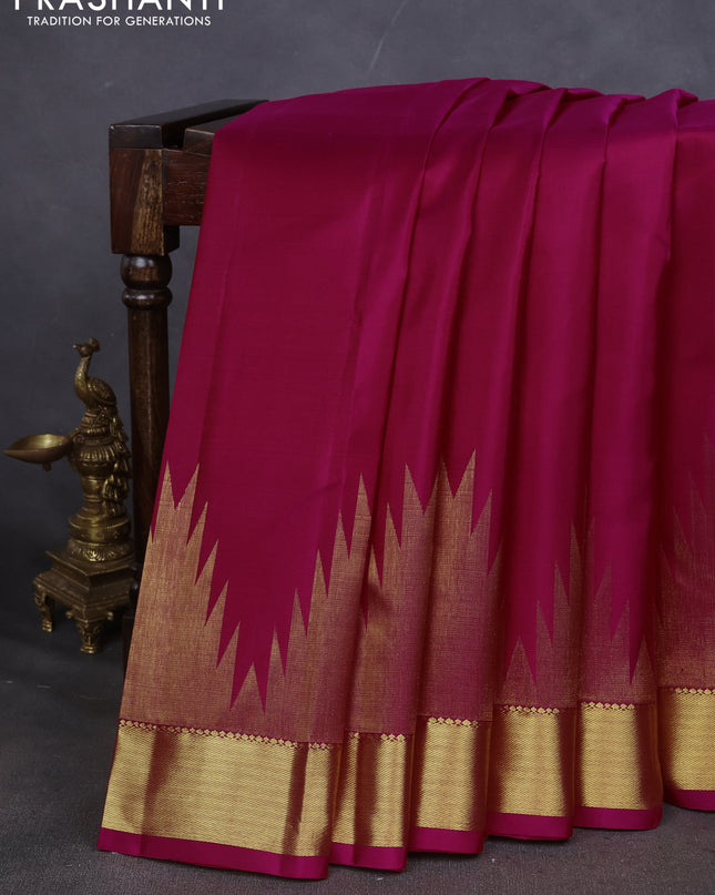 Pure kanchipuram silk saree pink with plain body and temple design zari woven border