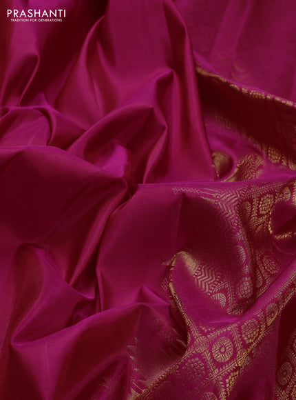 Pure kanchipuram silk saree pink with plain body and temple design zari woven border