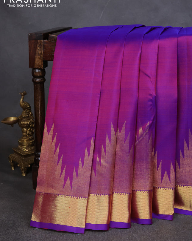 Pure kanchipuram silk saree purple with plain body and temple design zari woven border