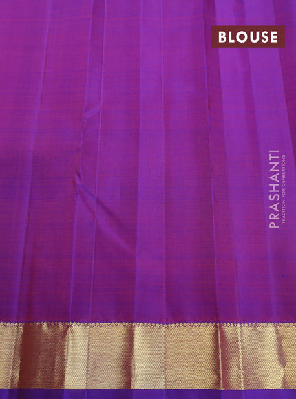 Pure kanchipuram silk saree purple with plain body and temple design zari woven border