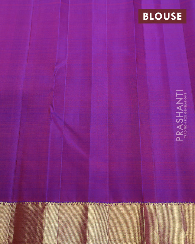 Pure kanchipuram silk saree purple with plain body and temple design zari woven border