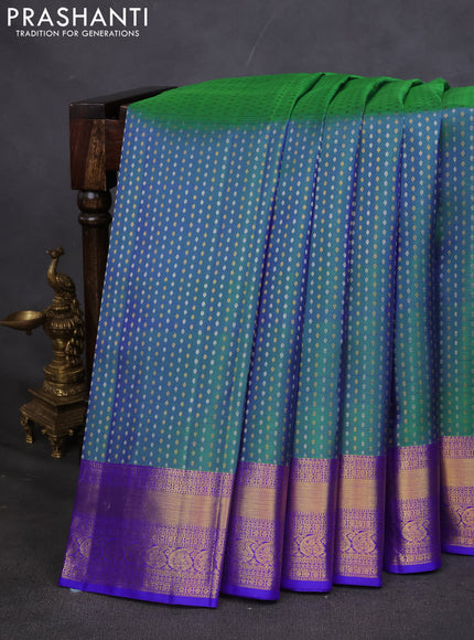 Pure kanchipuram silk saree dual shade of green and blue with allover silver & gold zari butta weaves and zari woven border