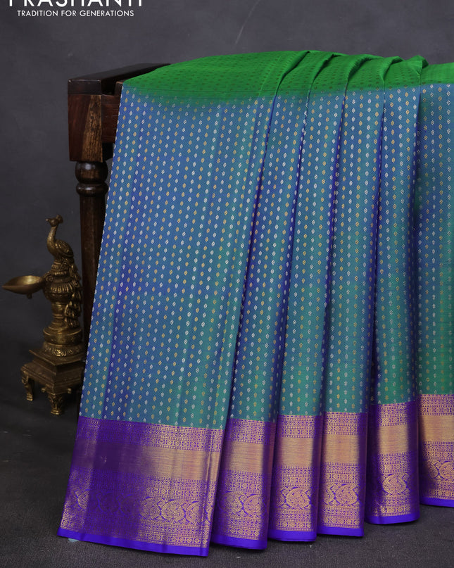 Pure kanchipuram silk saree dual shade of green and blue with allover silver & gold zari butta weaves and zari woven border