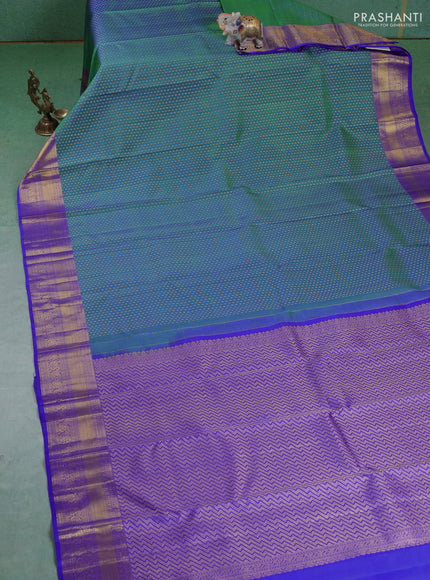 Pure kanchipuram silk saree dual shade of green and blue with allover silver & gold zari butta weaves and zari woven border