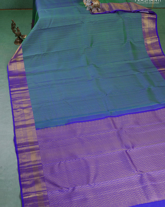 Pure kanchipuram silk saree dual shade of green and blue with allover silver & gold zari butta weaves and zari woven border