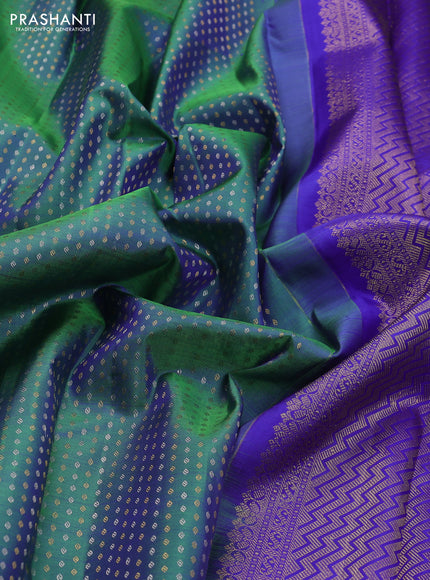 Pure kanchipuram silk saree dual shade of green and blue with allover silver & gold zari butta weaves and zari woven border