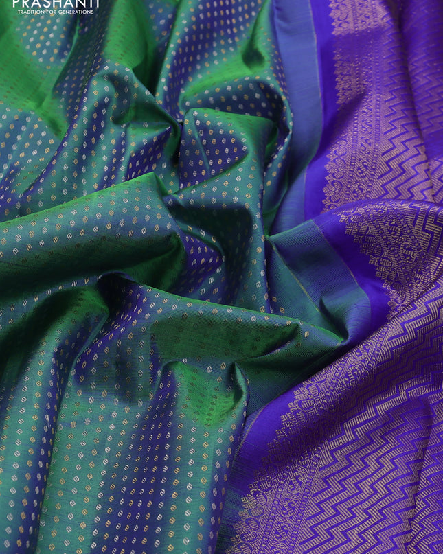 Pure kanchipuram silk saree dual shade of green and blue with allover silver & gold zari butta weaves and zari woven border