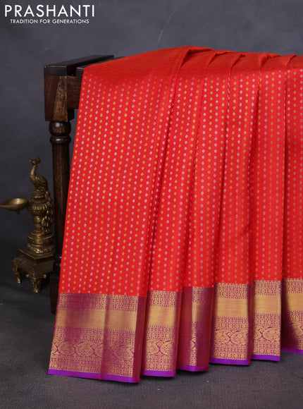 Pure kanchipuram silk saree orange and purple with allover silver & gold zari butta weaves and zari woven border