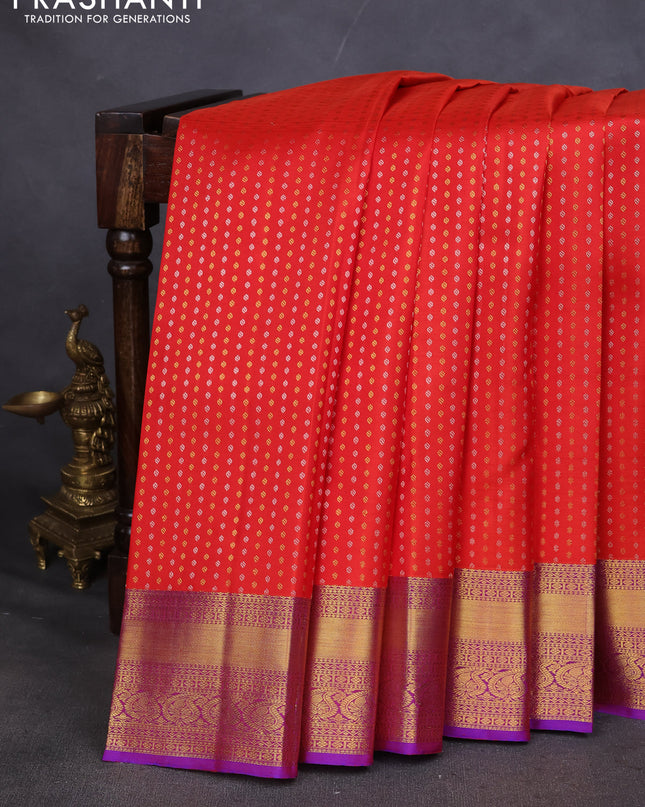 Pure kanchipuram silk saree orange and purple with allover silver & gold zari butta weaves and zari woven border