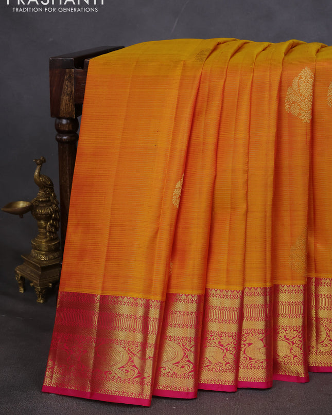 Pure kanchipuram silk saree mustard yellow and pink with allover zari weaves & buttas and zari woven border