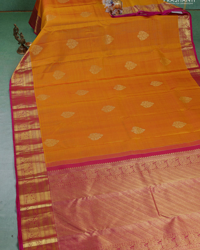 Pure kanchipuram silk saree mustard yellow and pink with allover zari weaves & buttas and zari woven border