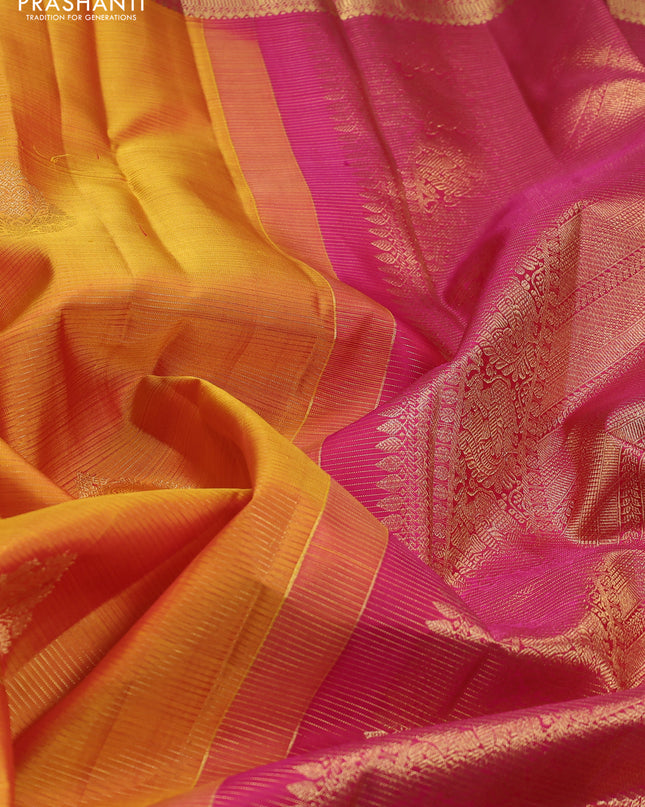Pure kanchipuram silk saree mustard yellow and pink with allover zari weaves & buttas and zari woven border