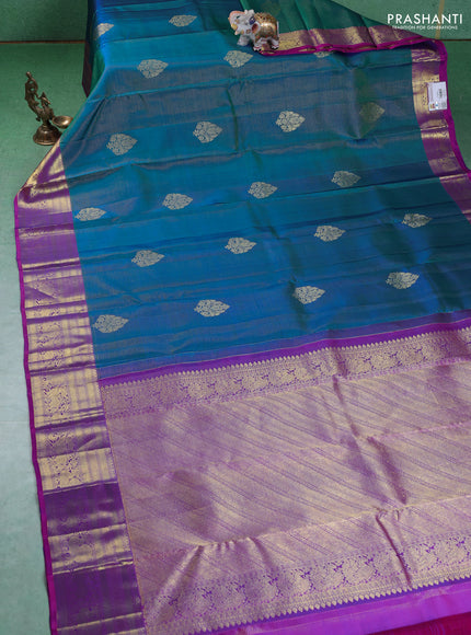 Pure kanchipuram silk saree dual shade of teal blue and purple with allover zari weaves & buttas and zari woven border