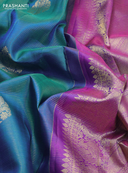 Pure kanchipuram silk saree dual shade of teal blue and purple with allover zari weaves & buttas and zari woven border