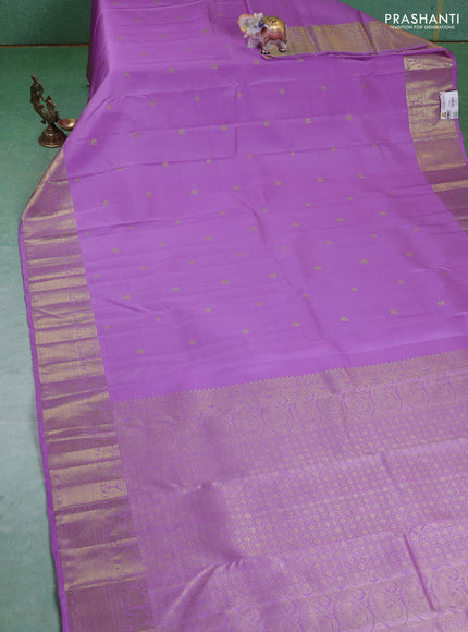 Pure kanchipuram silk saree lavender with annam zari woven buttas and zari woven border