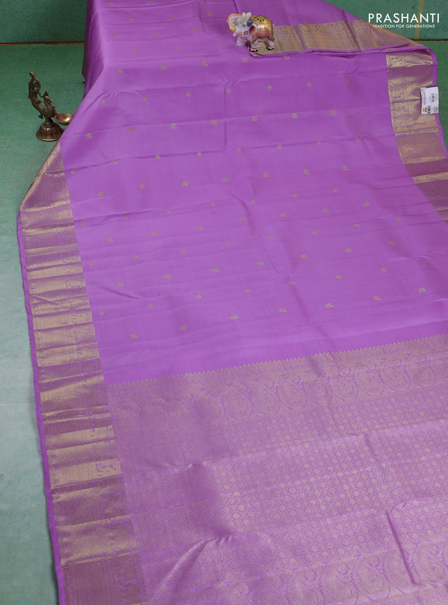 Pure kanchipuram silk saree lavender with annam zari woven buttas and zari woven border